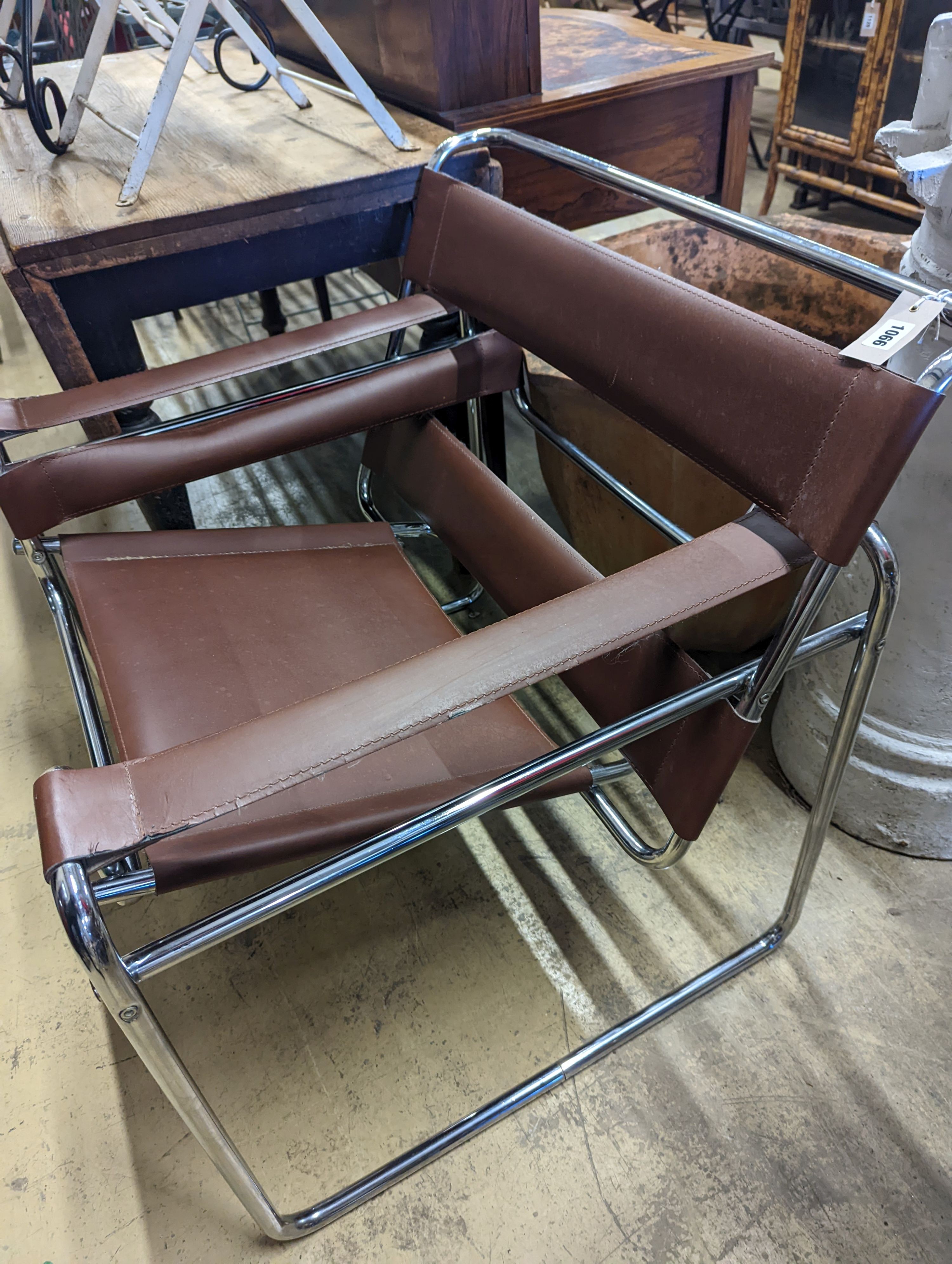 A Wassily style brown leather and chrome lounge chair, width 78cm, depth 68cm, height 75cm